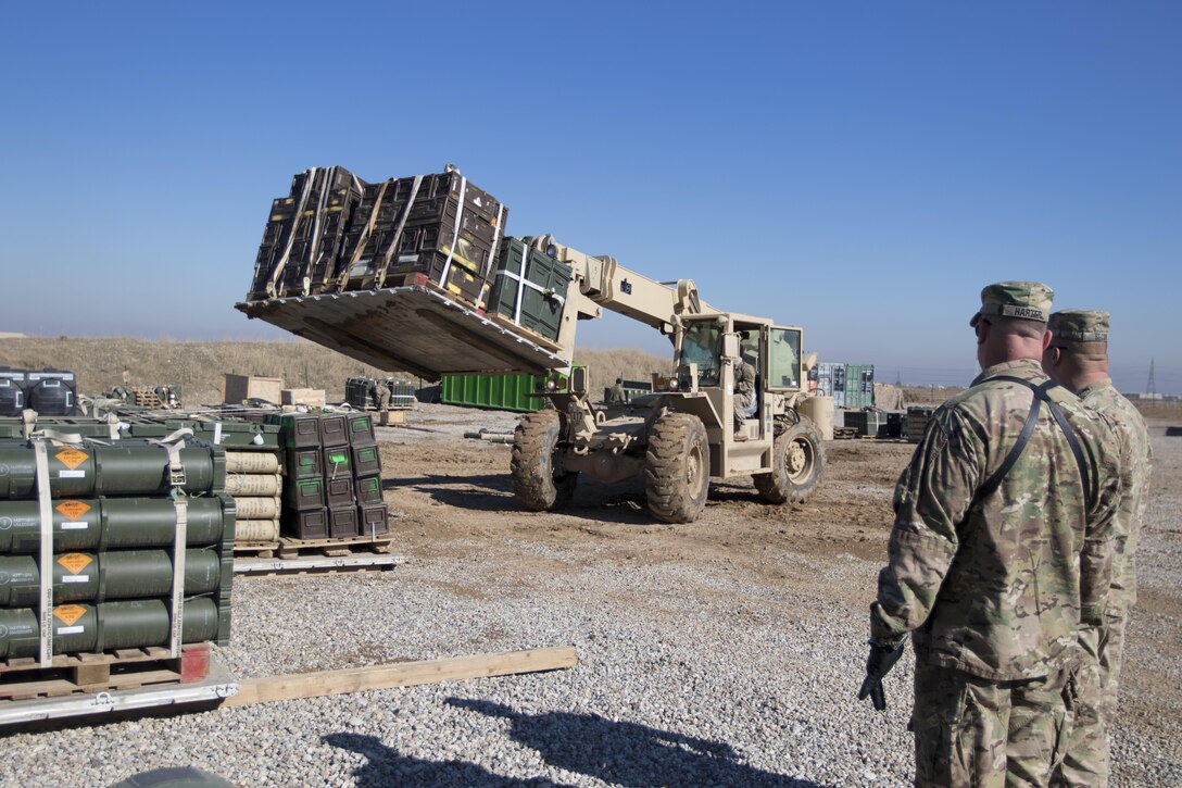 Brig. Gen. Robert D. Harter, deputy commanding general of the 1st Sustainment Command (Theater) / commanding general of the 316th Sustainment Command (Expeditionary), inspects the multi-national ammunition supply depot at Erbil, Iraq, on February 3, 2017. 