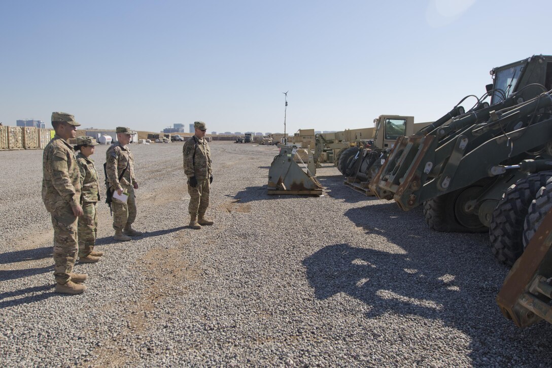 Brig. Gen. Robert D. Harter, deputy commanding general of the 1st Sustainment Command (Theater) / commanding general of the 316th Sustainment Command (Expeditionary), inspects the Movement Control Team’s staging yard at Erbil, Iraq, on February 3, 2017. 
