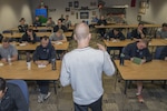 Tim “Red” Wakeham, Michigan State University strength and conditioning coach, speaks to Tactical Air Control Party instructors about Kinesiology and helped refined their training program at Joint Base San Antonio-Lackland Medina Annex Feb. 1, 2017. Kinesiology is the scientific study of human movement.
