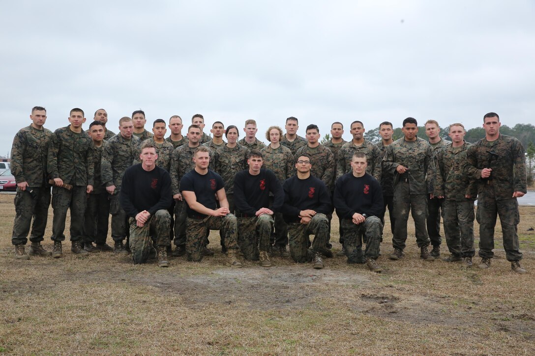 More than 20 Marines graduated from the Martial Arts Instructor course aboard Marine Corps Air Station Cherry Point, N.C., Feb. 3, 2017. The Marines endured 15 training days of being mentally and physically tested while learning how to properly and proficiently instruct the disciplines of the Marine Corps Martial Arts Program. Martial arts instructors serve the command by enhancing warrior ethos, resulting in more completely trained Marines who are part of a capable and combat-ready team. (U.S. Marine Corps photo by Lance Cpl. Cody Lemons/Released)