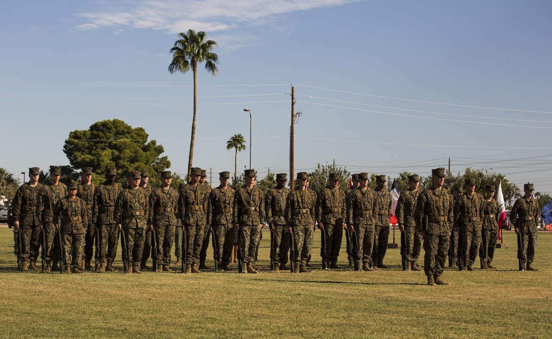 U.S. Marines with Headquarters and Headquarters Squadron participate in a platoon formation during the annual cake cutting ceremony and historical uniform pageant to celebrate the 241st Marine Corps birthday at Marine Corps Air Station Yuma, Ariz., Nov. 10, 2016. The uniform pageant and cake cutting ceremony are annual traditions held to celebrate the Marine Corps birthday, honor Marines of the past, present and future and signify the passing of traditions from one generation to the next. (U.S. Marine Corps photo by Lance Cpl. Christian Cachola/Released)
