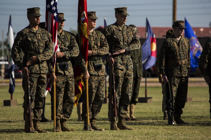 Headquarters and Headquarters Squadron’s color guard goes to “order arms” during the annual cake cutting ceremony and historical uniform pageant to celebrate the 241st Marine Corps birthday at Marine Corps Air Station Yuma, Ariz., Nov. 10, 2016. The uniform pageant and cake cutting ceremony are annual traditions held to celebrate the Marine Corps birthday, honor Marines of the past, present and future and signify the passing of traditions from one generation to the next. (U.S. Marine Corps photo by Lance Cpl. Christian Cachola/Released)