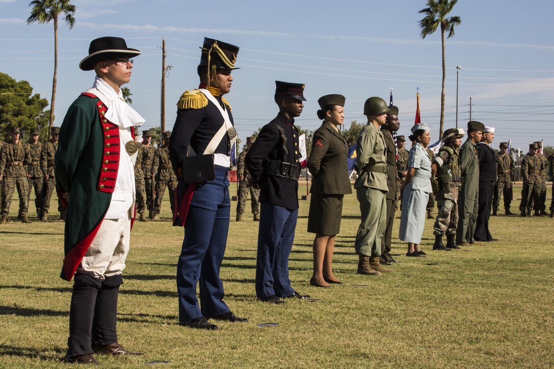 U.S. Marines with Headquarters and Headquarters Squadron participate in a historical uniform pageant at Marine Corps Air Station Yuma, Ariz., Nov. 10, 2016. The uniform pageant and cake cutting ceremony are annual traditions held to celebrate the Marine Corps birthday, honor Marines of the past, present and future and signify the passing of traditions from one generation to the next. (U.S. Marine Corps photo by Lance Cpl. Christian Cachola/Released)