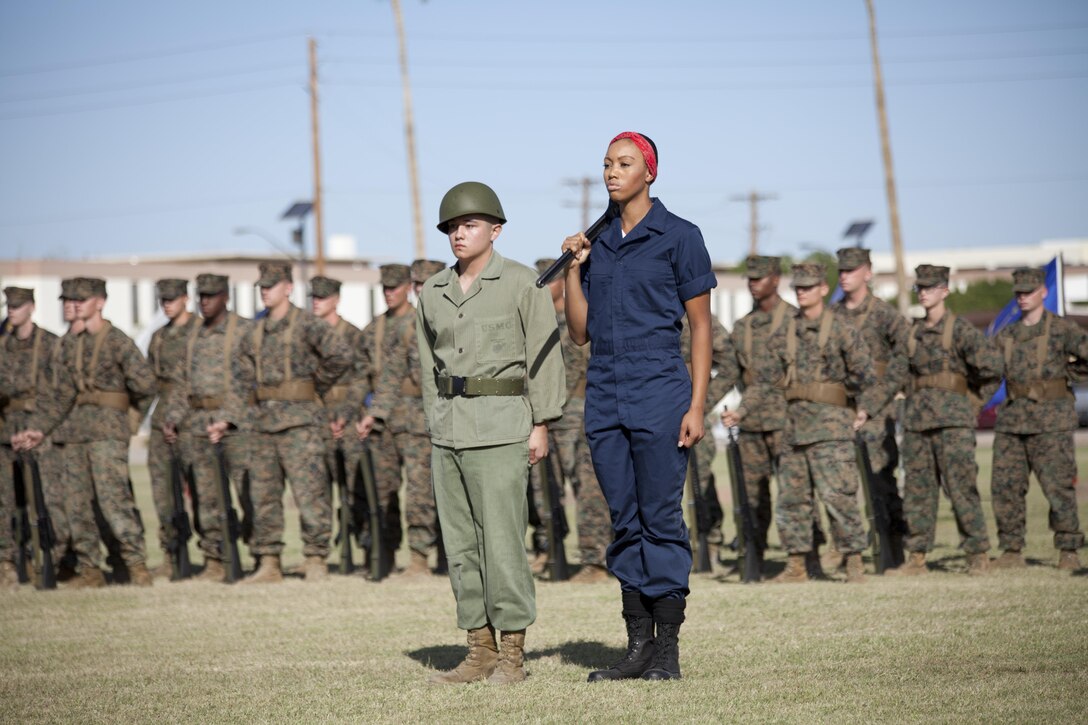 U.S. Marines with Headquarters and Headquarters Squadron participate in a historical uniform pageant at Marine Corps Air Station Yuma, Ariz., Nov. 10, 2016.  The ceremony celebrates the 241st birthday of the Marine Corps, and serves to honor Marines of the past, present and future while signifying the passing of traditions from one generation to the next. (U.S. Marine Corps photo by Lance Cpl. Joel Soriano/Released)