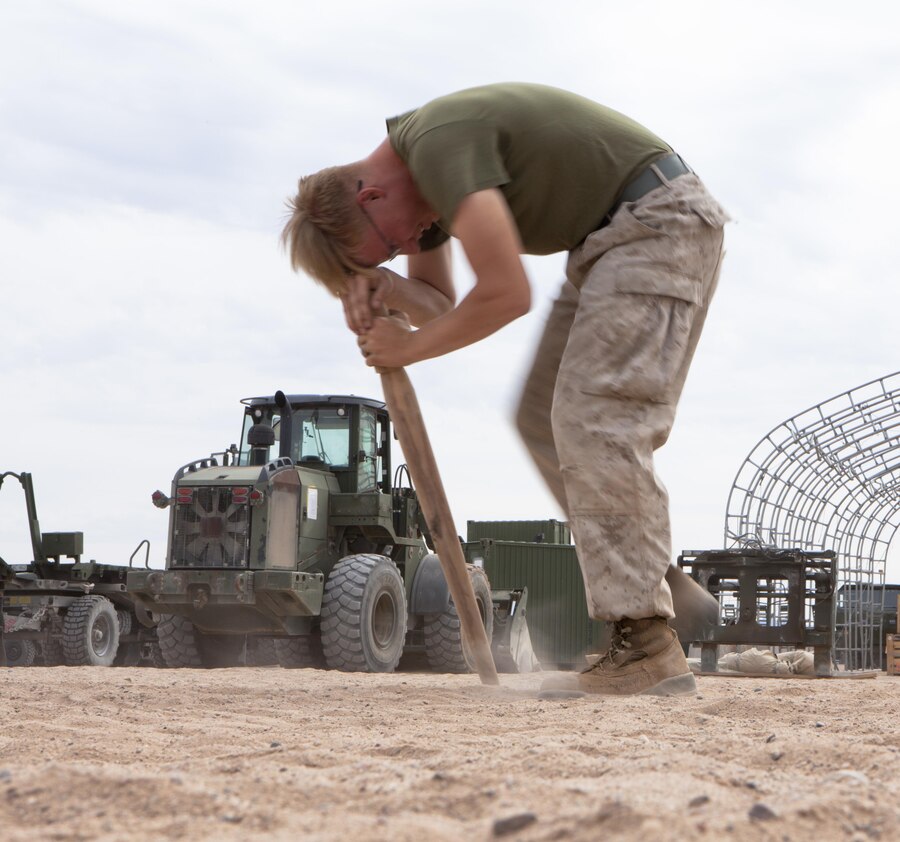 A U.S. Marine with 8th Engineer Support Battalion participates in a "dizzy izzies" exercise as part of a squad competition at Canon Air Defense Complex, Yuma, Ariz.. Oct. 24, 2016. Squad competitions happen among every squadron throughout the Marine Corps to build camaraderie and foster good-spirited competition between the separate elements that make up the unit. (U.S. Marine Corps photo taken by Cpl. Summer Romero/ Released)