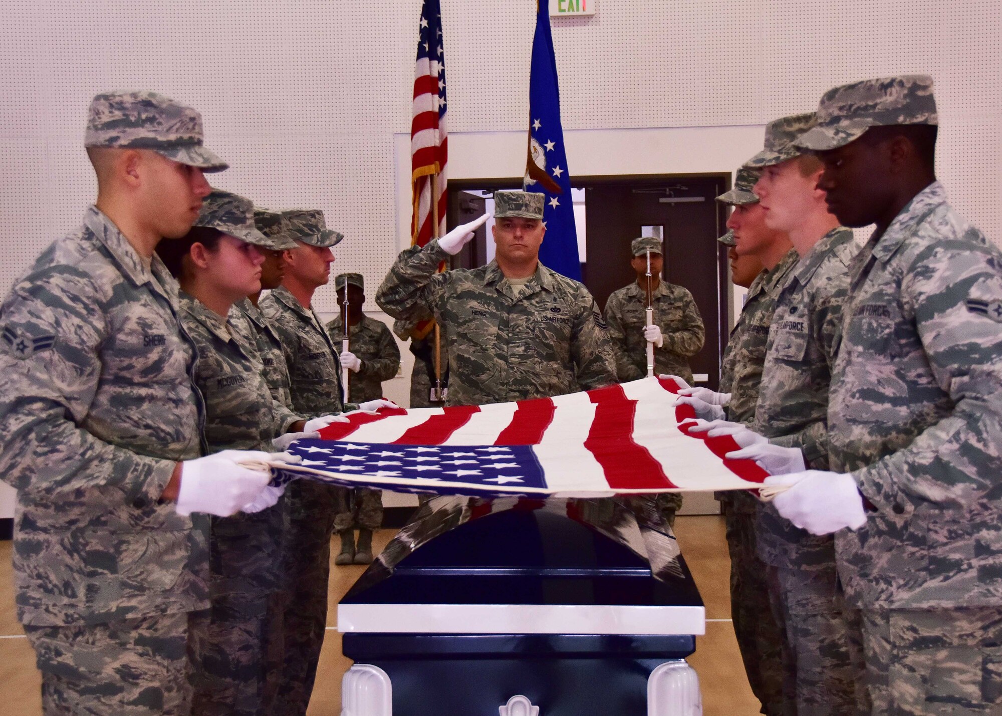 Airmen from the Basic Protocol, Honors, and Ceremonies course perform a military funeral service Feb. 1 during their graduation ceremony at Luke Air Force Base, Ariz. (U.S. Air Force photo by Tech. Sgt. Louis Vega Jr.)