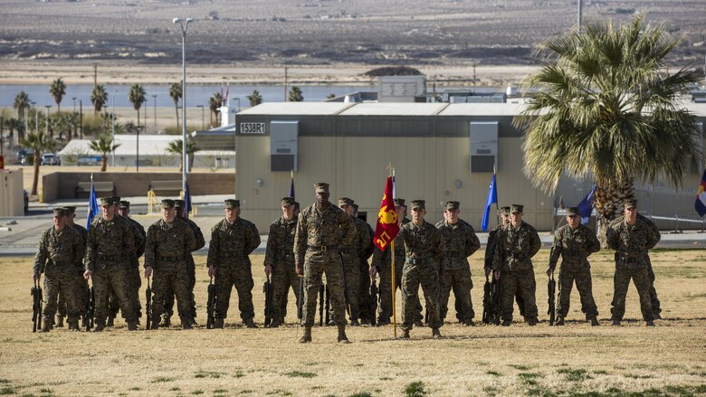 Weapons Company for 2nd Battalion, 7th Marine Regiment, stands in formation during a relief and appointment ceremony at Lance Cpl. Torrey L. Gray Field, Feb. 3, 2017. During the ceremony, Sgt. Maj. Gabriel E. Macias relinquished his post as battalion sergeant major to Sgt. Maj. Jared A. Hoversten. (U.S. Marine Corps photo by Cpl. Levi Schultz)