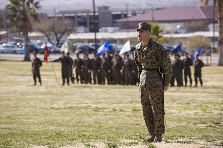 First Sgt. Kim A. Rowland, company first sergeant, Company G, 2nd Battalion, 7th Marine Regiment, yells commands during a relief and appointment ceremony at Lance Cpl. Torrey L. Gray Field, Feb. 3, 2017. During the ceremony, Sgt. Maj. Gabriel E. Macias relinquished his post as battalion sergeant major to Sgt. Maj. Jared A. Hoversten. (U.S. Marine Corps photo by Cpl. Levi Schultz)