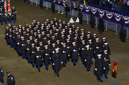 Members of the U.S. Marine Corps march along Pennsylvania Avenue during the inaugural parade in Washington, D.C., Jan. 20, 2017. More than 5,000 military members across from all branches of the armed forces of the United States, including Reserve and National Guard components, provided ceremonial support and Defense Support of Civil Authorities during the inaugural period. (DoD photo by U.S. Air Force Staff Sgt. Logan Carlson)