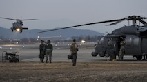 A combat search and rescue team assigned to the 33rd Rescue Squadron from Kadena Air Base, Japan, prepares to launch for a training mission during Exercise Pacific Thunder 17-1 at Osan Air Base, Republic of Korea, Feb. 2, 2017. Exercise Pacific Thunder is a Pacific Air Forces exercise that combines the rescue capabilities of U.S. and ROK air force rescue units with the close air support of A-10 Thunderbolt IIs, assigned to the 25th Fighter Squadron, in realistic training missions flown in mountainous Korean terrain. (U.S. Air Force photo by Staff Sgt. Victor J. Caputo)
