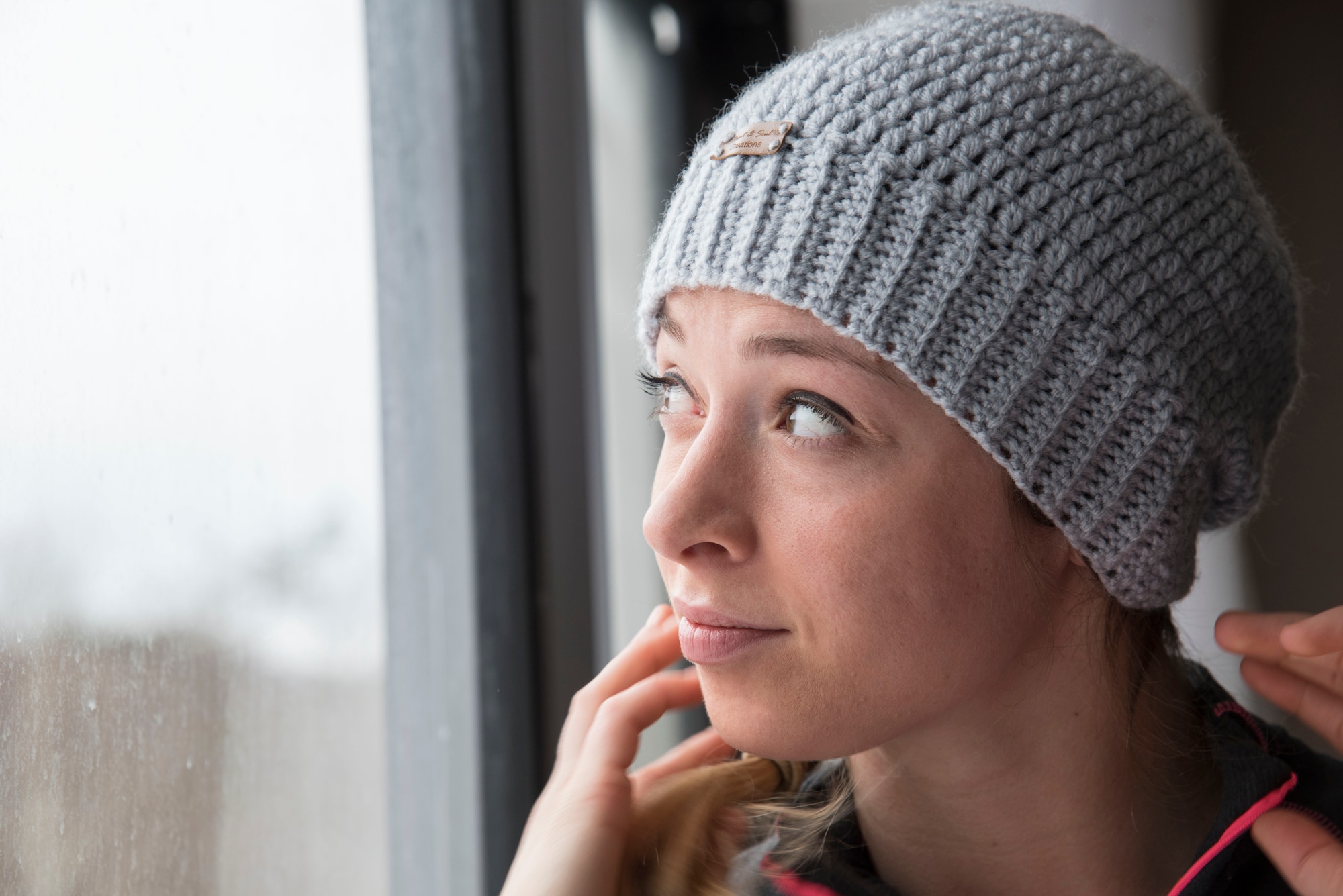 U.S. Air Force Airman 1st Class Katelin Napolitano, a 35th Medical Operations Squadron urgent care clinic technician, dons her knit hat at a ski resort in Hachimantai, Japan, Jan. 29, 2017. Airmen spent two days at the resort to practice their four Air Force pillars of resiliency including: physical, mental, social and spiritual. (U.S. Air Force photo by Airman 1st Class Sadie Colbert)