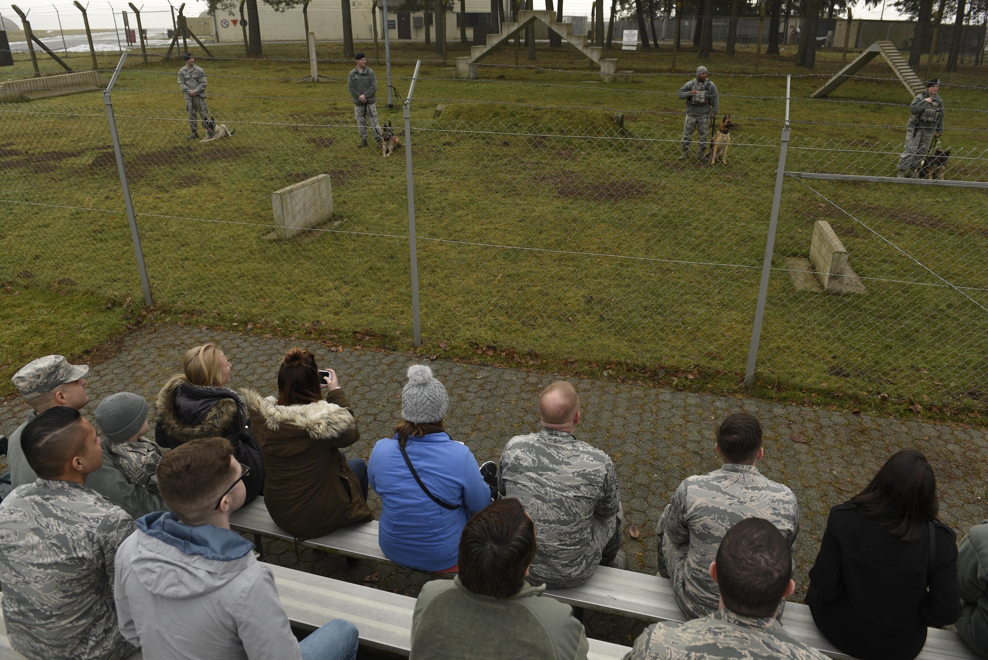 Annual award nominees watch a demonstration by the 52nd Security Forces Squadron military working dogs on Spangdahlem Air Base, Germany, Feb. 2, 2017. The nominees were given a base tour which included the fire department, MWD and explosive ordnance disposal. (U.S. Air Force photo by Staff Sgt. Jonathan Snyder)