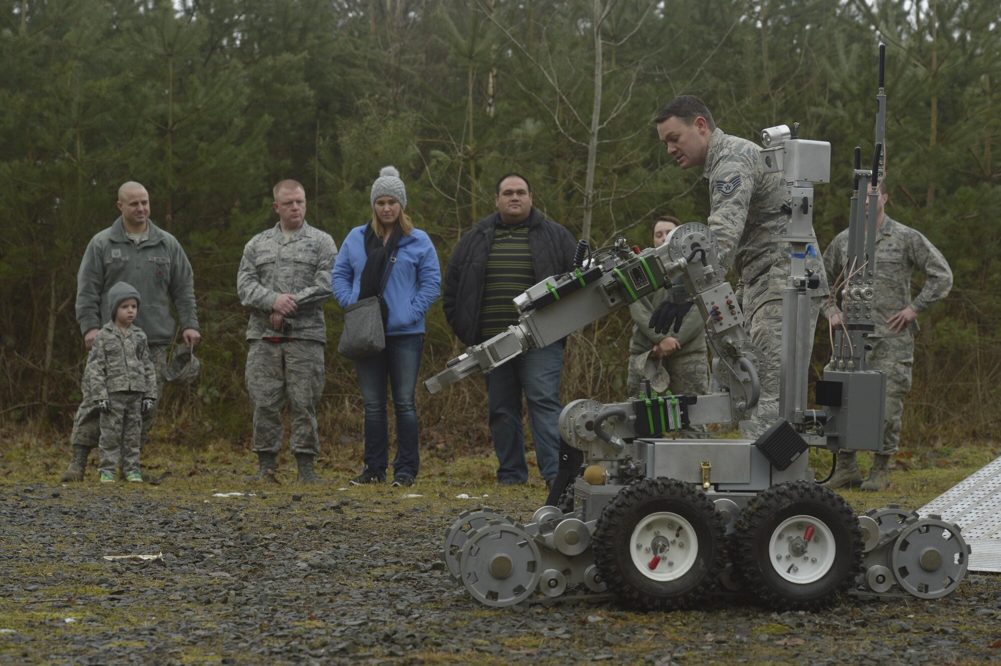 Annual award nominees watch a demonstration by Staff Sgt. Cole Carroll, 52nd Civil Engineer Squadron explosive ordnance disposal, on Spangdahlem Air Base, Germany, Feb. 2, 2017. The nominees were given a base tour which included the fire department, military working dogs and EOD. (U.S. Air Force photo by Staff Sgt. Jonathan Snyder)