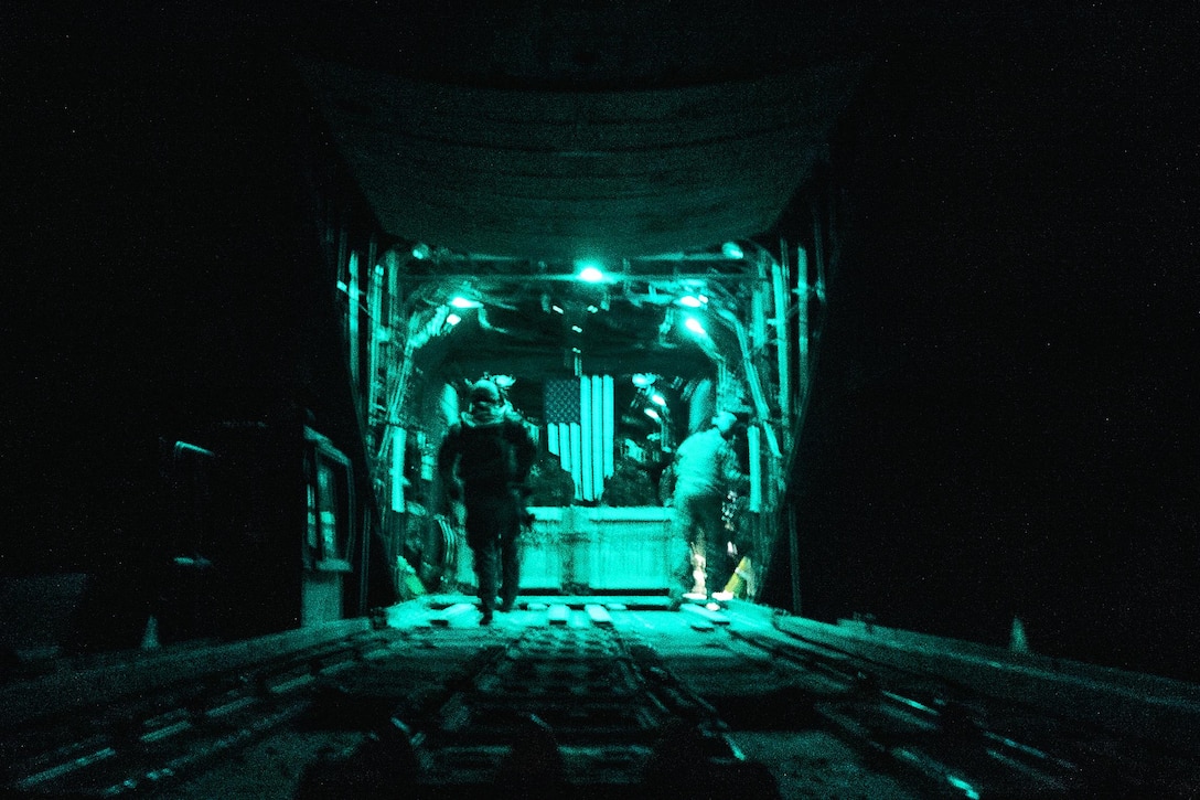 Airmen secure cargo inside a C-130H Hercules aircraft at Qayyarah Airfield West, Iraq, Feb. 3, 2017. Air Force photo by Senior Airman Jordan Castelan