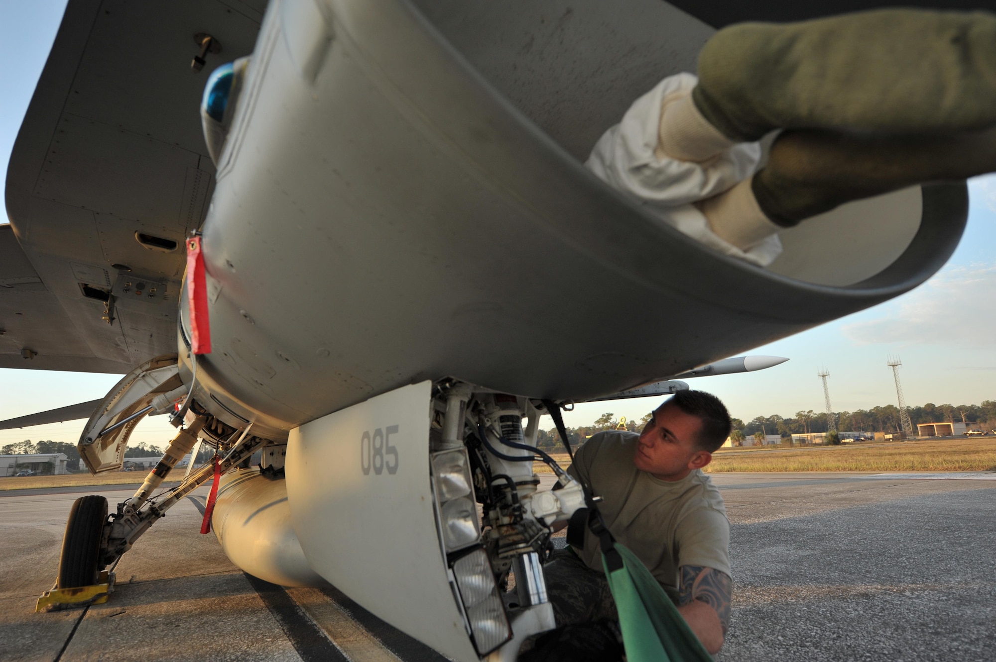U.S. Air Force Staff Sgt. Joshua Miller, a crew chief assigned to the 180th Fighter Wing, Ohio Air National Guard, prepares an F-16 Fighting Falcon for takeoff during a training exercise at MacDill Air Force Base in Tampa, Florida on Feb. 2, 2017. The 180th brought F-16s and more than 150 maintainers, pilots, and operations support personnel to MacDill AFB for a two-week training exercise which included basic fighter maneuvers against F-18 Hornets from the Canadian 425th Tactical Fighter Squadron, sharpening the combat capabilities of 180FW Airmen. (Air National Guard photo by Tech. Sgt. Nic Kuetemeyer)