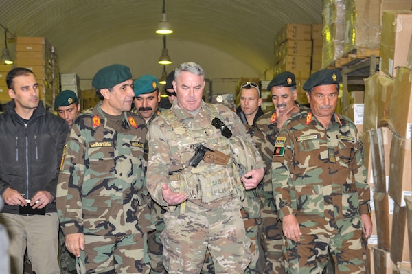 Maj. Gen. Richard G. Kaiser, commanding general of Combined Security Transition Command- Afghanistan, tours the logistics warehouses of the 215th Corps in Helmand in February, 2017 to assess logistical challenges and evaluate next steps to build capacity and sustainment progression for Operation Shafaq II Campaign. Accompanying him was Afghan Maj. Gen. Ahmadzai Sakhi, assistant director of the Ministry of Defense for technology, acquisition and logistics.



"Our visit to the 215th Corps was to observe the Operation Shafaq II campaign sustainment progression by senior leadership from MoD and to personally evaluate critical areas where Combined Security Transition Command- Afghanistan can provide support," said Maj. Gen. Richard G. Kaiser, commanding general of CSTC-A. (U.S. Navy photo by Lt. j.g. Egdanis Torres Sierra, Combined Security Transition Command CSTC–A Public Affairs)