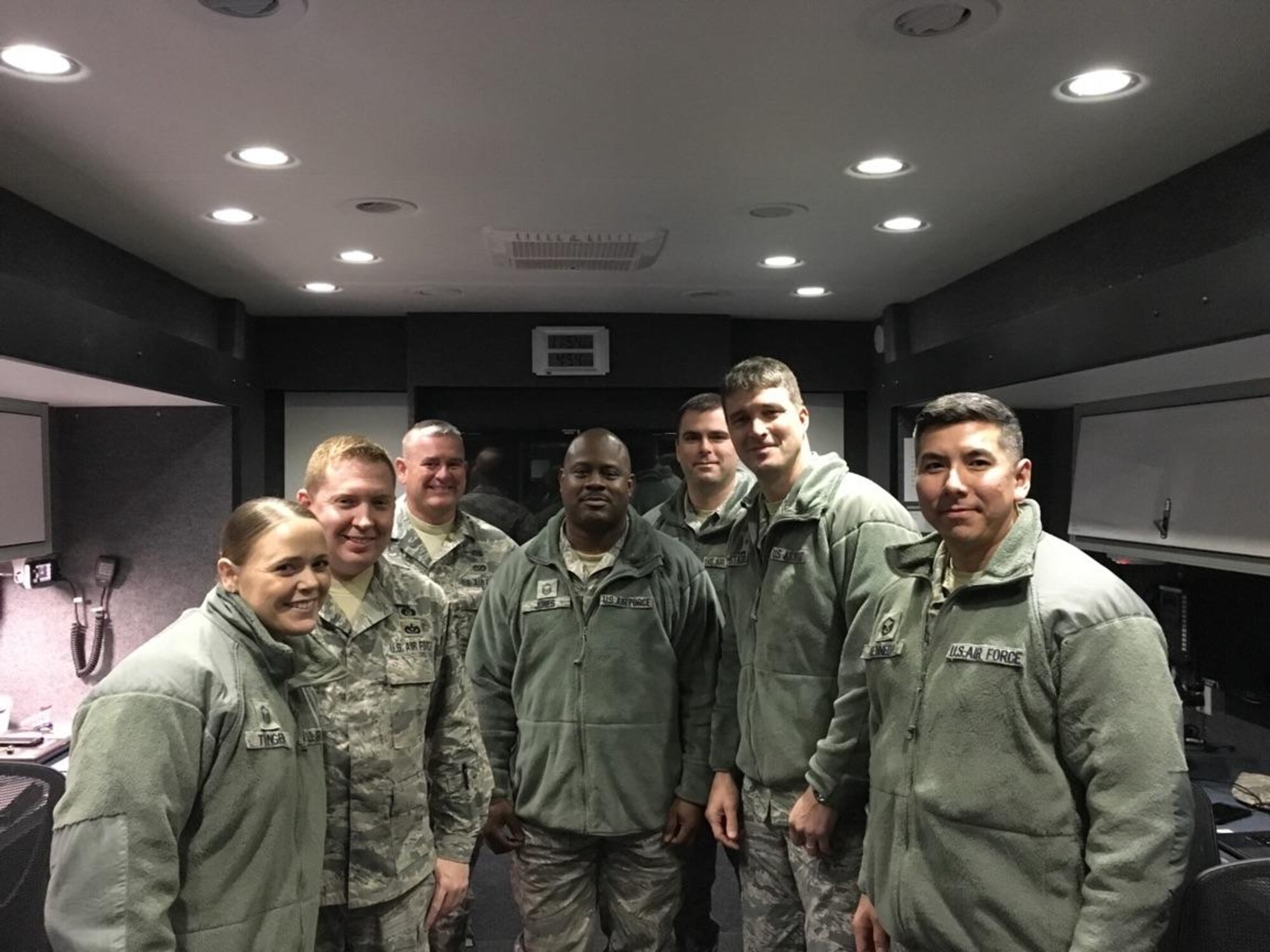 The North Carolina Air National Guard Mobile Emergency Operations Center (MEOC) team poses for a group photo to commemorate their experience supporting the 58th United States Presidential inauguration. From Left to Right, Master Sg.t Rebecca Tongen, Staff Sgt. Mark Fow, Senior Master Sgt. James Cutshaw, Master Sgt. Timothy Jones, Staff Sergeant Benjamin Elliot, Brigadier Gen. Staudenraus, and Master Sgt. Erik Kennedy. The team’s mission is to provide backup communications to three tactical operations centers Task Force Security, Task Force Crowd, and Task Force Access, in Washington D.C. About 8000 soldiers and airmen are tasked to support the ceremony on Jan. 20, 2017. (U.S. Air National Guard photo credited to Master Sgt. Rebecca S. Tongen)