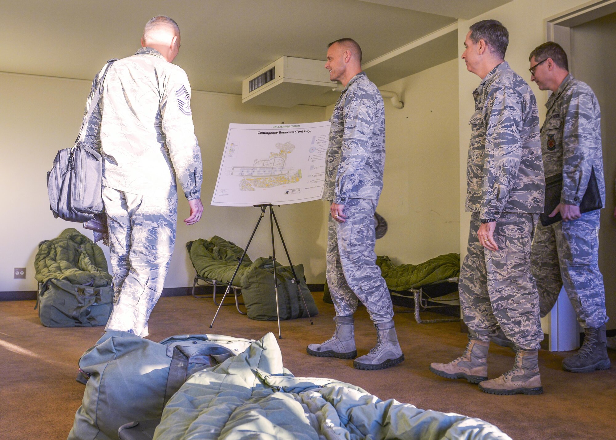 Maj. Gen. Bradley Spacy, Air Force Installation and Mission Support Center commander, observes the design of a contingency beddown in a temporary lodging facility at Yokota Air Base, Japan, Jan. 30, 2017. Since Spacy’s command has changed to integrate functions that provide direct support to operational commanders, he is interested in identifying ways in which installations and missions can improve to support the PACAF mission.