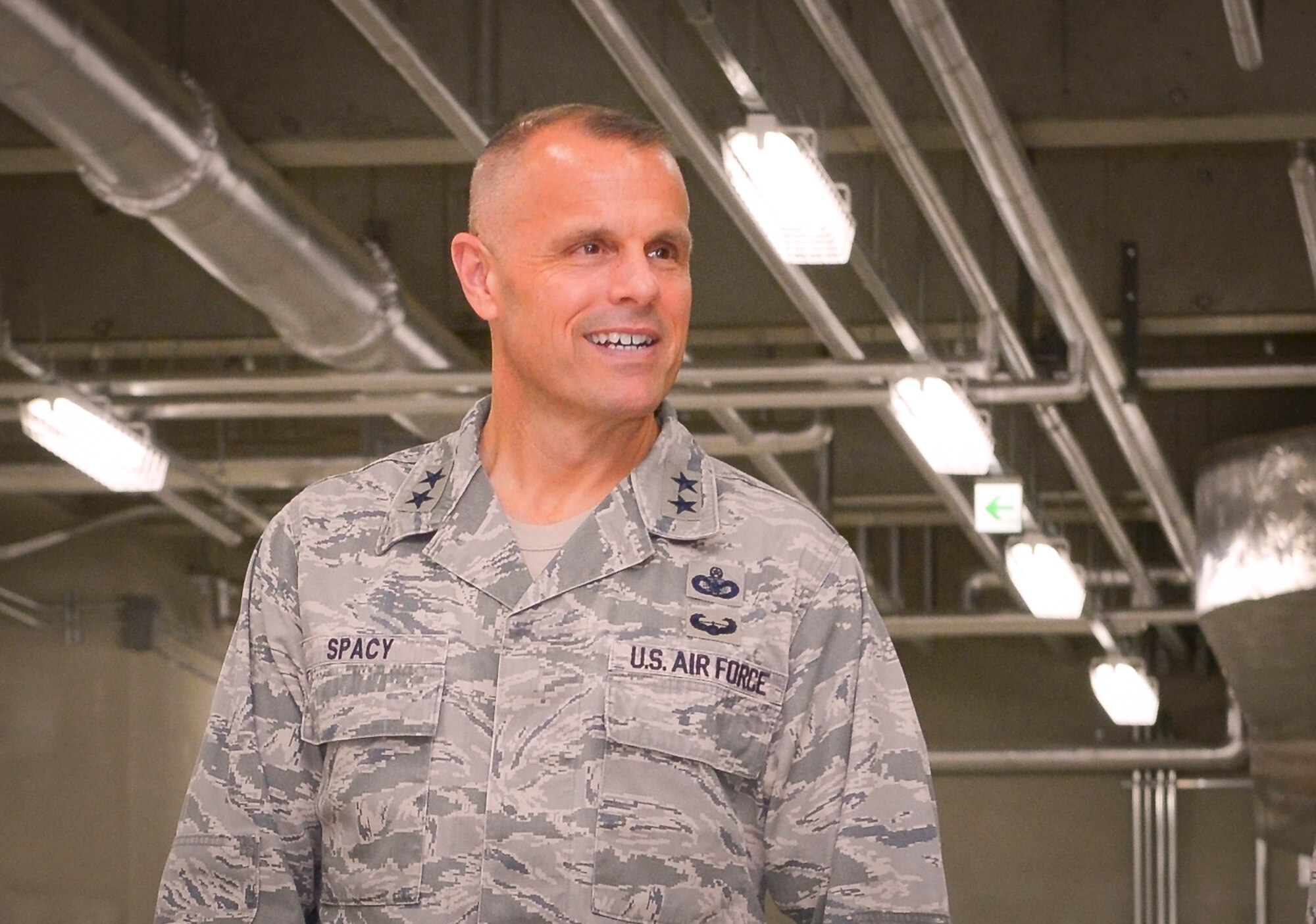 Maj. Gen. Bradley Spacy, Air Force Installation and Mission Support Center commander, tours a new 374th Security Forces Squadron facility warehouse on Yokota Air Base, Japan, Jan. 30, 2017. Spacy visited three Pacific Air Forces bases to see the installation and mission support operations across the board. (U.S. Air Force photo by Senior Airman Elizabeth Baker)