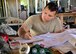 Staff Sgt. John Irving from the 143d Civil Engineering Squadron (CES), Rhode Island Air National Guard rinse creates a material list for electrical work in Inarajan, Guam during an Innovative Readiness Training (IRT) project on September 5, 2016.  The IRT project, in conjunction with Habitat for Humanity Guam is to provide two homes for residents in Inarajan.  The members are part of a 36 Airmen crew from a cross section of trades within the CES.  U.S. Air National Guard photo by Master Sgt. John V. McDonald