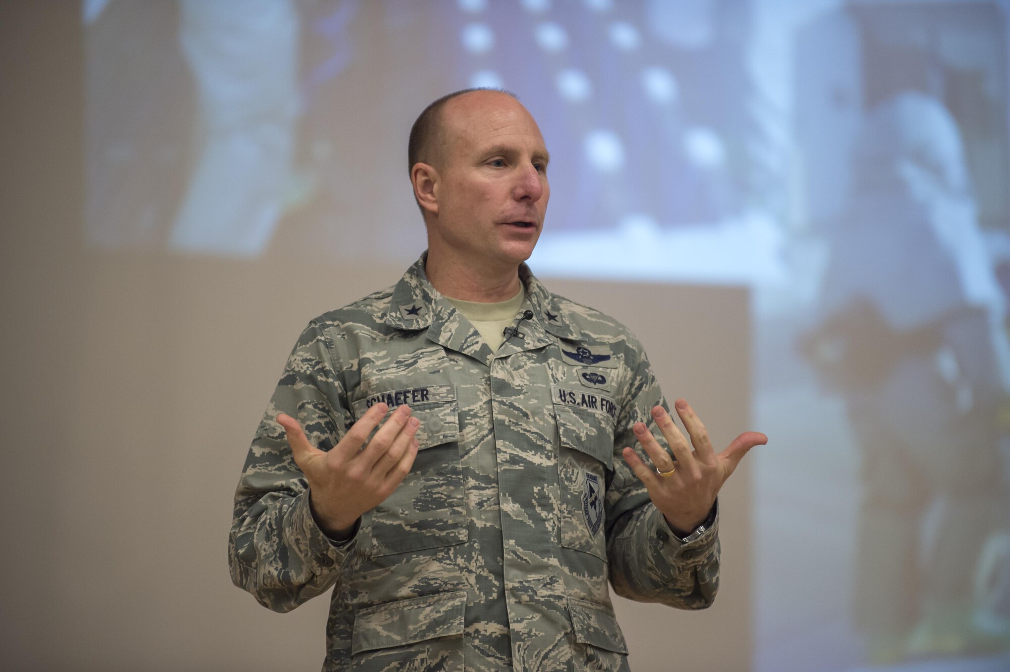 Brig. Gen. Carl Schaefer, 412th Test Wing commander, addresses the audience during his commander's call Feb. 1 in the base theater. (U.S. Air Force photo by Kyle Larson)