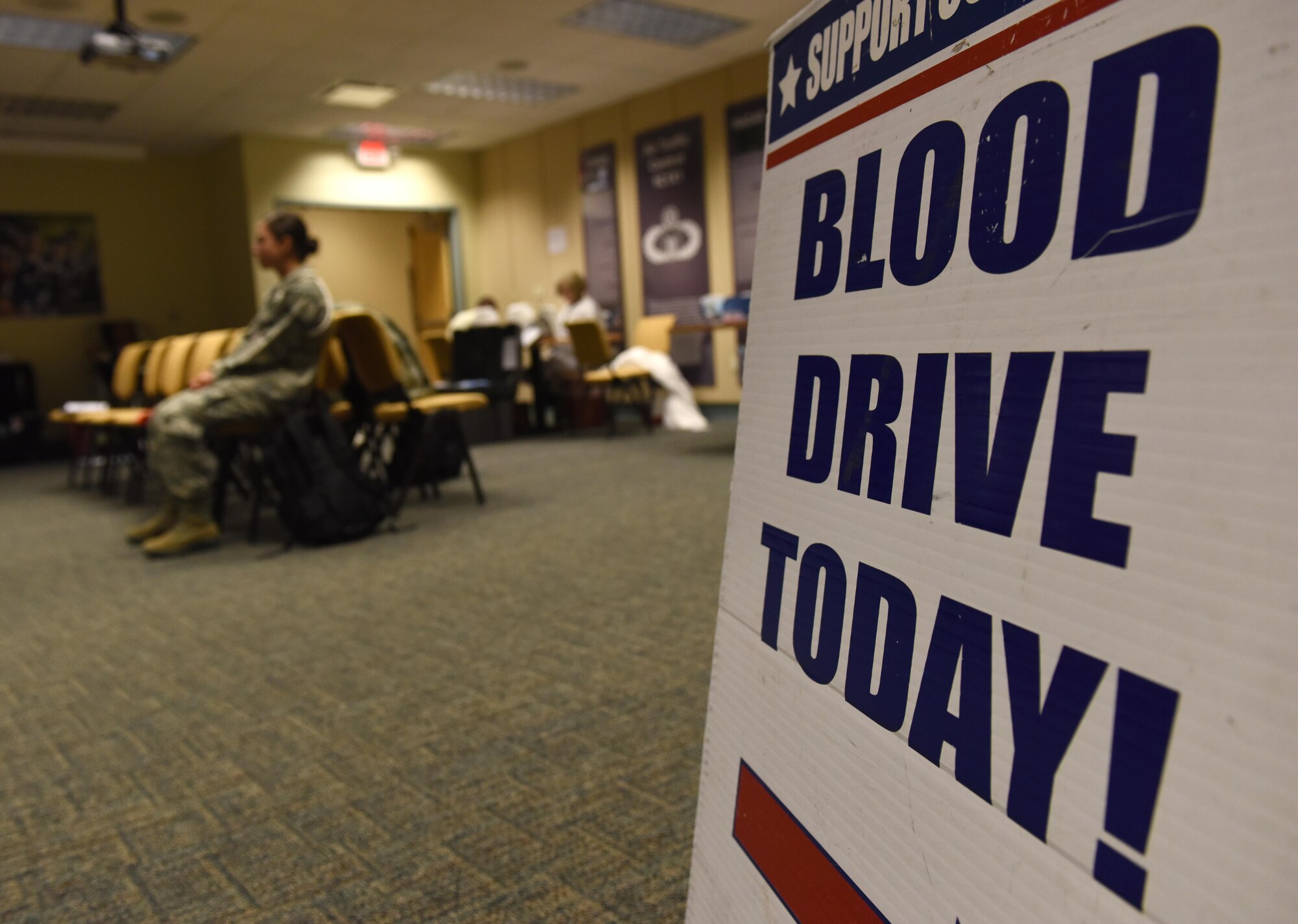 A Keesler Blood Donor Center sign sits on display during a blood drive at Cody Hall Nov. 21, 2016, on Keesler Air Force Base, Miss. The Keesler Blood Donor Center is one of three Air Force blood donor centers and supports the Armed Services Blood Program by collecting blood for the Defense Department for use in deployed locations and military treatment facilities. (U.S. Air Force photo by Senior Airman Holly Mansfield)  