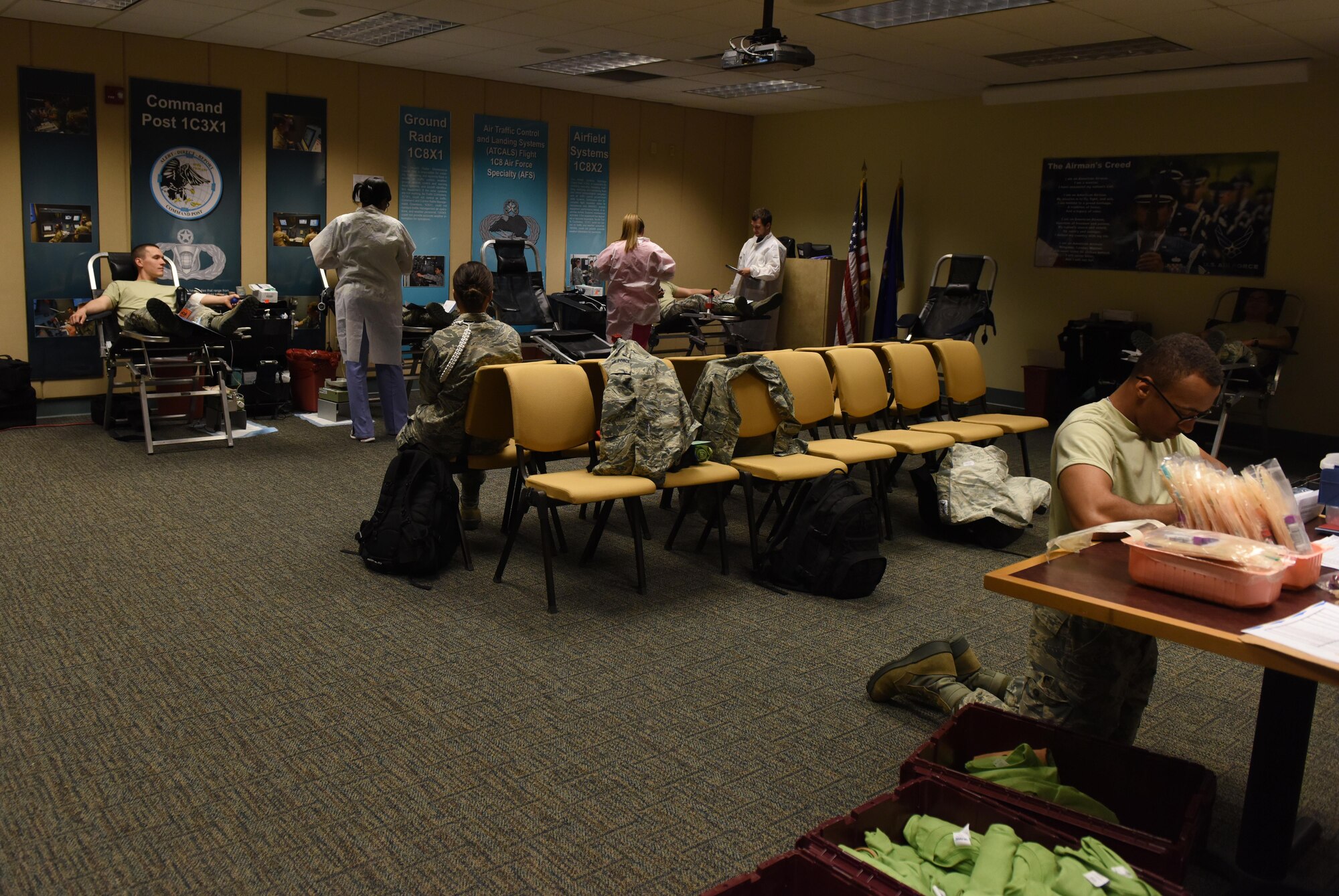 Members of Team Keesler participate in a blood drive at Cody Hall Nov. 21, 2016, on Keesler Air Force Base, Miss. The Keesler Blood Donor Center is one of three Air Force blood donor centers and supports the Armed Services Blood Program by collecting blood for the Defense Department for use in deployed locations and military treatment facilities. (U.S. Air Force photo by Senior Airman Holly Mansfield)  