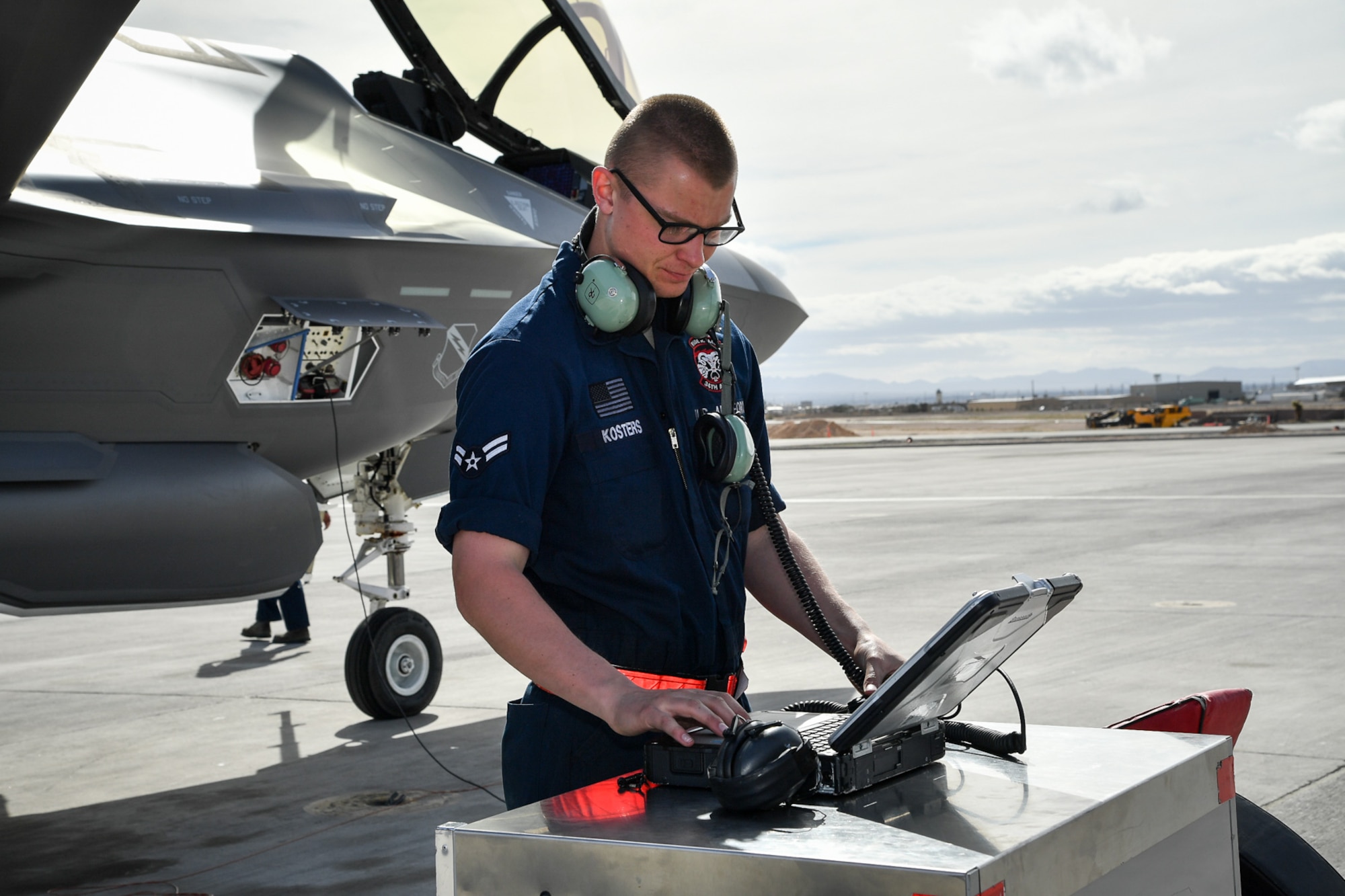 Airman 1st Class Nathan Kosters, a crew chief with the 34th Aircraft Maintenance Unit, prepares to launch an F-35A Lightning II aircraft during Red Flag 17-1 at Nellis Air Force Base, Nevada, Feb. 7, 2017. (U.S. Air Force photo/R. Nial Bradshaw)