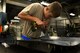 U.S. Air Force Airman 1st Class Daniel Meadows, 20th Equipment Maintenance Squadron aircraft structural maintenance apprentice, removes and replaces rivets on a gun door at Shaw Air Force Base, S.C., Feb. 8, 2017. Meadows replaced the rivets to restore the structural integrity of the piece so it could be reinstalled onto an F-16CM Fighting Falcon. (U.S. Air Force photo by Airman 1st Class Destinee Sweeney)