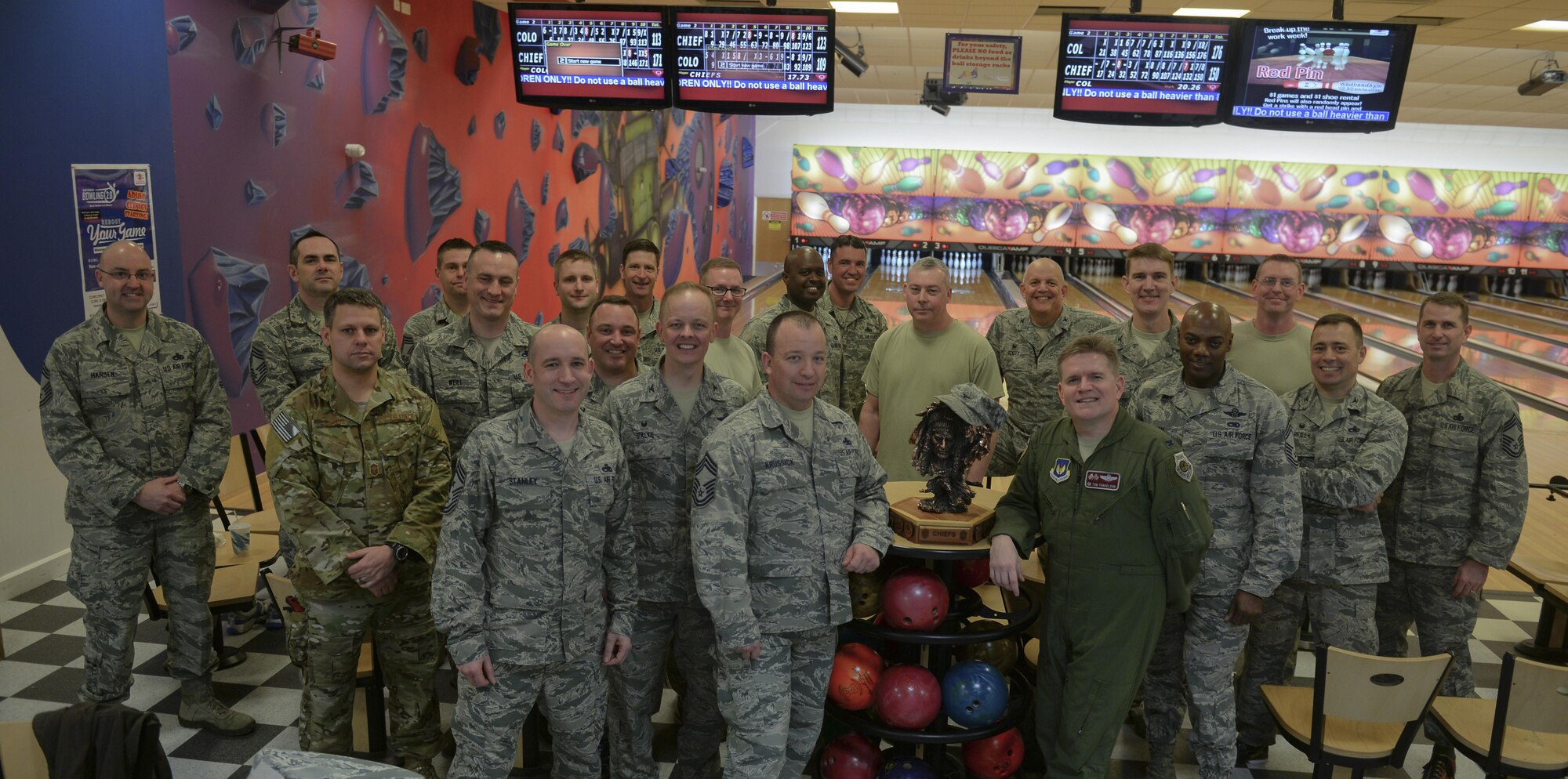 Team Mildenhall’s leaders pose for a photo after a “Chiefs vs. Eagles” game Feb. 7, 2017, on RAF Mildenhall, England. After two games of bowling on three lanes the final total score was Chiefs: 878 to the Eagles: 762. (U.S. Air Force photo by Staff Sgt. Micaiah Anthony) 