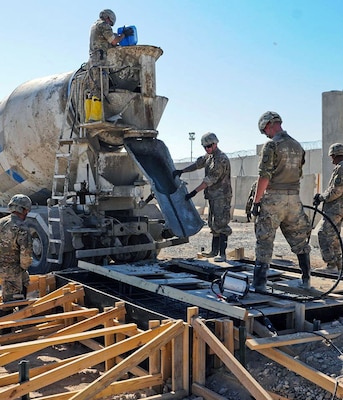 Horizontal construction engineers assigned to the 368th Engineer Battalion of the U.S. Army Reserve use a cement truck to build a concrete slab in Afghanistan. The battalion is assigned to the 176th Engineer Brigade (Task Force Chaos). Task Force Chaos is responsible for mission command and control of more than 1,600 Active Duty, National Guard and Army Reserve engineer forces across the U.S. Central Command area of responsibility while deployed. (U.S. Army photo courtesy photo/released)