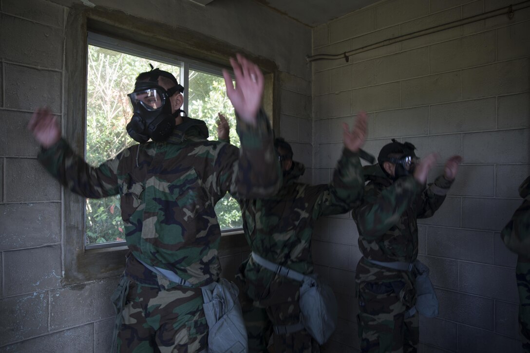 Marines participate in gas mask training at Marine Corps Air Station Futenma, Okinawa, Japan, Feb. 2. 2017. Marine Corps photo by Lance Cpl. Brooke A. Deiters