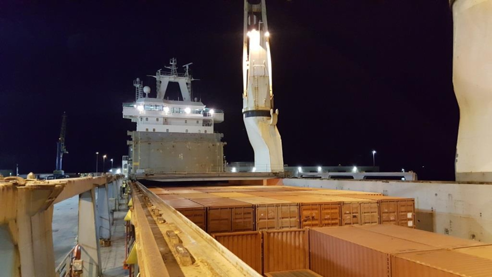 Cargo containers are stacked in one of the hatches on the MV Ocean Giant, for its trip in support of the National Science Foundation’s Antarctic research mission in McMurdo Station, Antarctica.