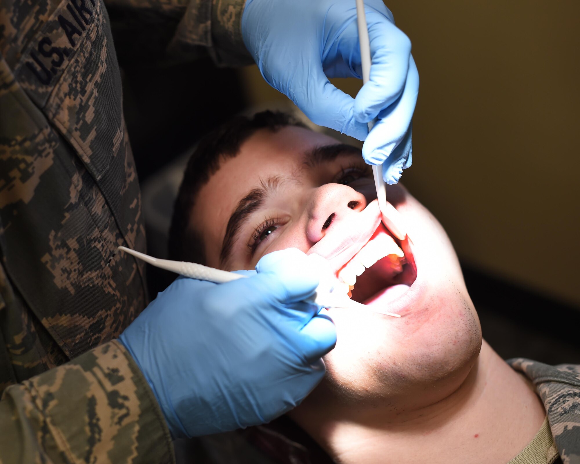 U.S. Air Force airmen from the 133rd Airlift Wing process through the 133rd Medical Group’s clinic in St. Paul, Minn., Jan. 21, 2017. The airmen are preparing to deploy and are receiving the necessary immunizations, updating any dental or optical requirements, and visiting with base doctors as needed. 
(U.S. Air National Guard photo by Tech. Sgt. Austen R. Adriaens/ Released)