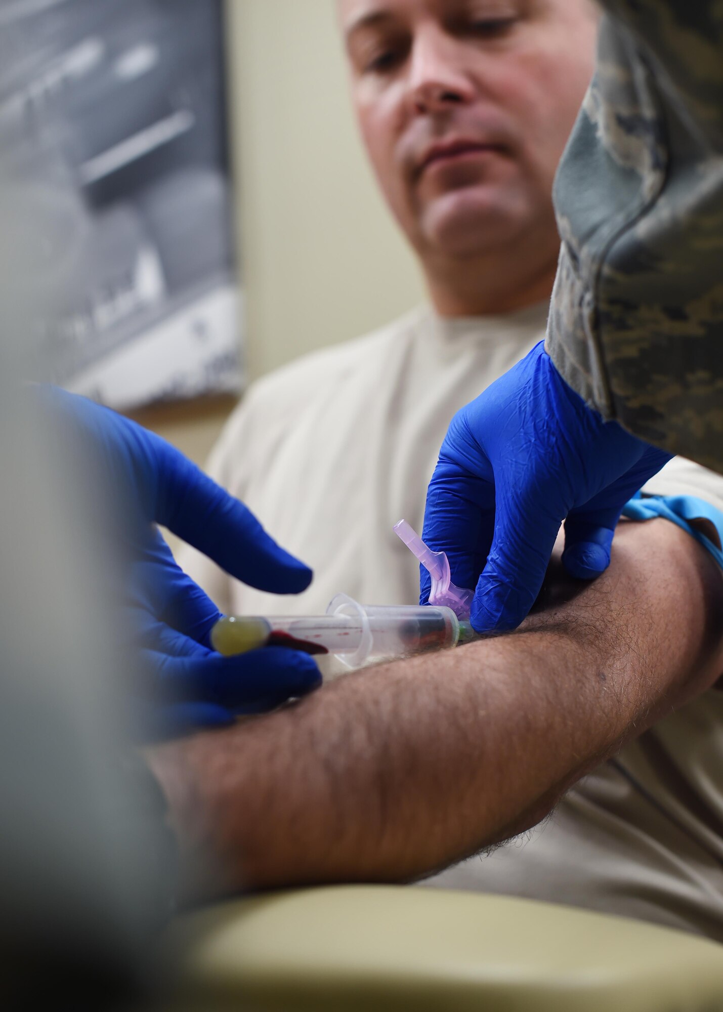 U.S. Air Force airmen from the 133rd Airlift Wing process through the 133rd Medical Group’s clinic in St. Paul, Minn., Jan. 21, 2017. The airmen are preparing to deploy and are receiving the necessary immunizations, updating any dental or optical requirements, and visiting with base doctors as needed. 
(U.S. Air National Guard photo by Tech. Sgt. Austen R. Adriaens/ Released)