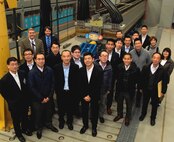 DAHLGREN, Va. - Military and civilian leaders from Japan's Self-Defense Forces (JSDF) and Ministry of Defense are pictured in front of the U.S. Navy's electromagnetic railgun prototype launcher after observing a live railgun demonstration, Feb. 7. Naval Surface Warfare Center Dahlgren Division (NSWCDD) engineers briefed the delegation on electromagnetic launchers and hypervelocity projectiles at the command's railgun facility. Subsequently, the 19 JSDF officers and Ministry of Defense officials visited the Center for Surface Combat Systems and AEGIS Training and Readiness Center to learn more about AEGIS training and observe the Baseline 9 lab, collocated with NSWCDD at Naval Support Facility Dahlgren. 

The military officers represented the Japanese Maritime Self-Defense Force (JMSDF) as well as the Japanese Army and Air Force. JMSDF is the naval branch of the Japan Self-Defense Forces, tasked with the naval defense of Japan. It also participates in UN-led peacekeeping operations and maritime interdiction operations. The Center for Strategic and International Studies - who sponsored and coordinated the visit - is a bipartisan, nonprofit policy research organization dedicated to providing strategic insights and policy solutions to help decision-makers chart a course toward a better world. 