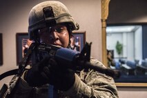The 375th Security Forces Squadron work with the 375th Medical Group for an active shoort exercise. Medical group teams applied moulage to "victims" before the exercise started and placed them around the Scott Event Center before the exercise started. The exercise helped security forces personnel identify any short falls or limiting factors in respone capabilities and gave them a chance to test and train new tactics and procedues. It also afforded security forces the opportunity to train with the other first responders (fire department and medical) to ensure they can work cohesivley to neutralize the threat, secure the scene and treat victims and casualties as soon as possible. The overall goal is to be prepared to respond efficienty and effectively to minimize the loss of life in the event of an active shooter.(U.S. Air Force photos/Senior Airman Tristin English)