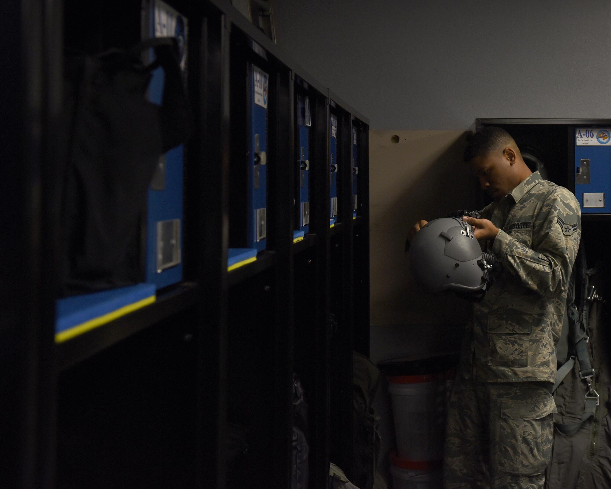 U.S. Air Force Airman 1st Class Donvin Farquharson, 325th Operations Support Group aircrew flight equipment technician, performs the final inspection on a pilot’s helmet before clearing it for use at Tyndall Air Force Base, Fla., Feb. 1, 2017. Aircrew flight equipment technicians ensure that all flight and safety equipment is in perfect working order. (U.S. Air Force photo by Airman 1st Class Cody R. Miller/Released)