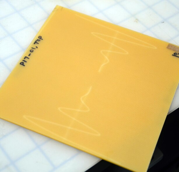 Embedded channel systems can be 3-D printed within an aerospace-grade structural composite in diverse shapes to flow liquid metal alloys to different positions, ultimately changing the function of embedded radio frequency antennas. (U.S. Air Force photo/Marisa Alia-Novobilski)

