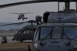 Three HH-60 Pave Hawks assigned to the 33rd Rescue Squadron from Kadena Air Base, Japan, are prepared for training missions at Osan Air Base, Republic of Korea, Feb. 2, 2017. The 33rd RQS was one of the units participating in Exercise Pacific Thunder 17-1, a Pacific Air Forces combat search and rescue exercise held in the ROK.