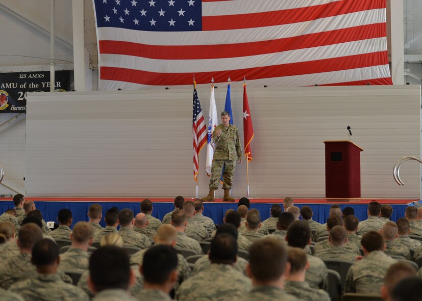U.S. Army Reserve Maj. Gen. Mark T. McQueen, 108th Training Command commander, speaks at the Comprehensive Airman Fitness day opening presentations at Tyndall Air Force Base, Fla., Feb. 3, 2017. McQueen spoke to Tyndall Airmen about stress coping practices and overcoming obstacles. (U.S. Air Force photo by Tech. Sgt. Javier Cruz/Released)  