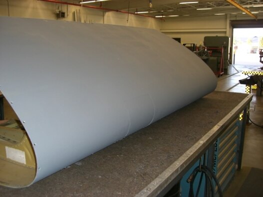 Piece of a C-130J Super Hercules Aircraft after repair by the 403rd Fabrication Flight Sept. 12, 2012 at Keesler Air Force Base, Mississippi. (U.S. Air Force courtesy photo)