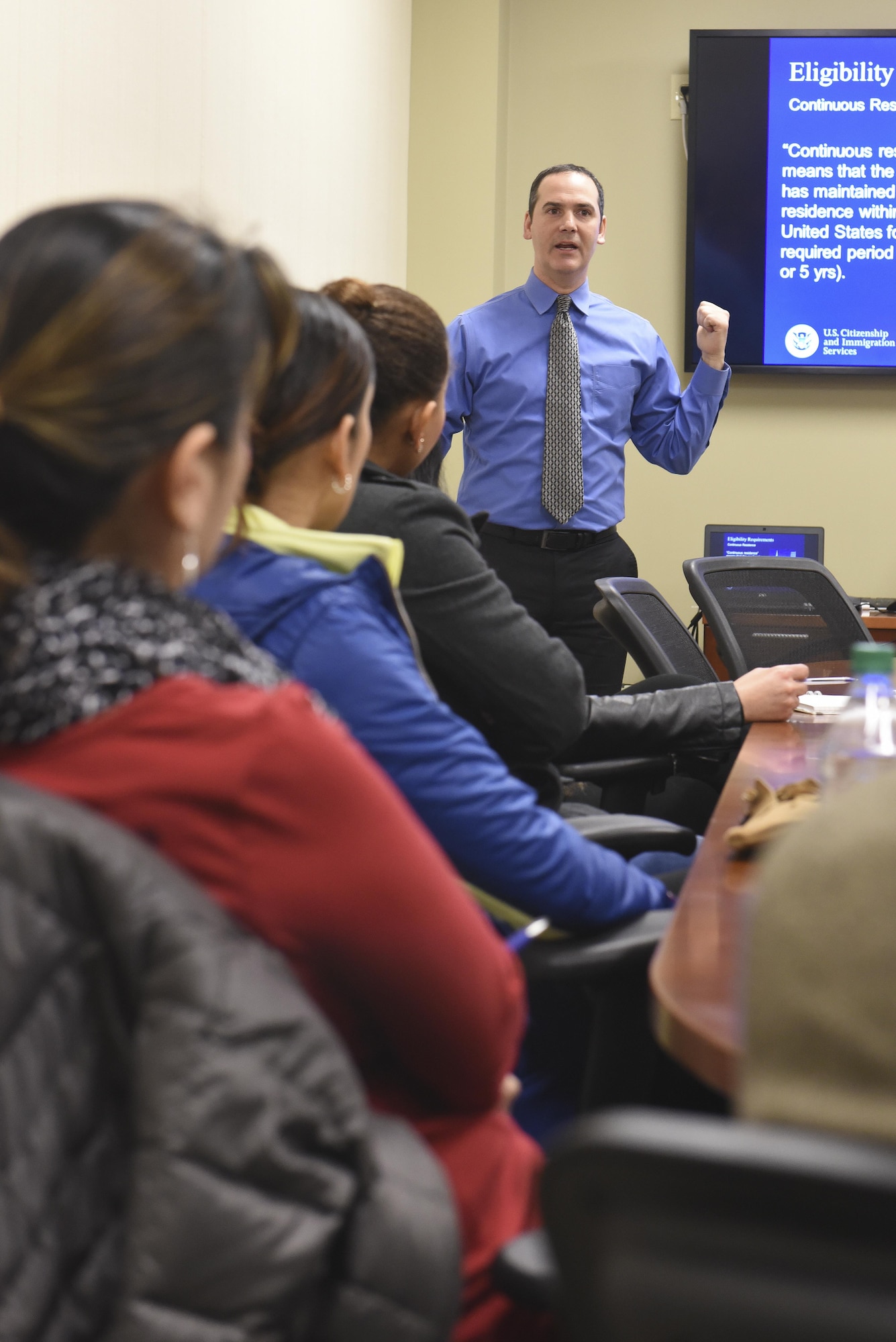 Keith Dorr, Mount Laurel Citizenship and Immigration Services, conducts a naturalization seminar at the Military Family Support Center on Joint Base McGuire-Dix-Lakehurst, New Jersey, Feb. 7, 2016. The seminar answered questions about the application process but primarily focused on the benefits CAIS can provide servicemembers.