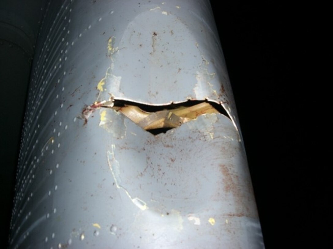 Piece of a C-130J Super Hercules Aircraft before repair by the 403rd Fabrication Flight Sept. 12, 2012 at Keesler Air Force Base, Mississippi. (U.S. Air Force courtesy photo)