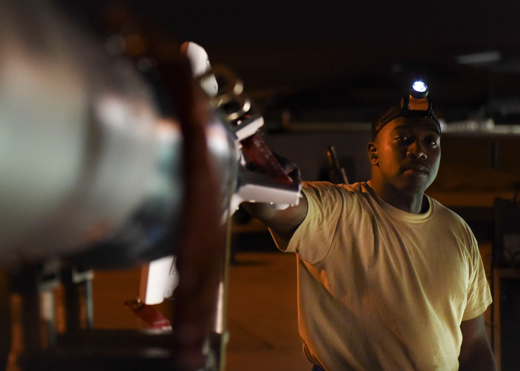 Senior Airman Ja’mouri Moye, 2nd Aircraft Maintenance Squadron weapons load crew member, finishes unloading a Guided Bomb Unit-12 at Barksdale Air Force Base, La., Feb. 6, 2017. The primary mission of Combat Hammer is to verify the combat capability of precision-guided weapon systems. (U.S. Air Force photo/Airman 1st Class Stuart Bright)
