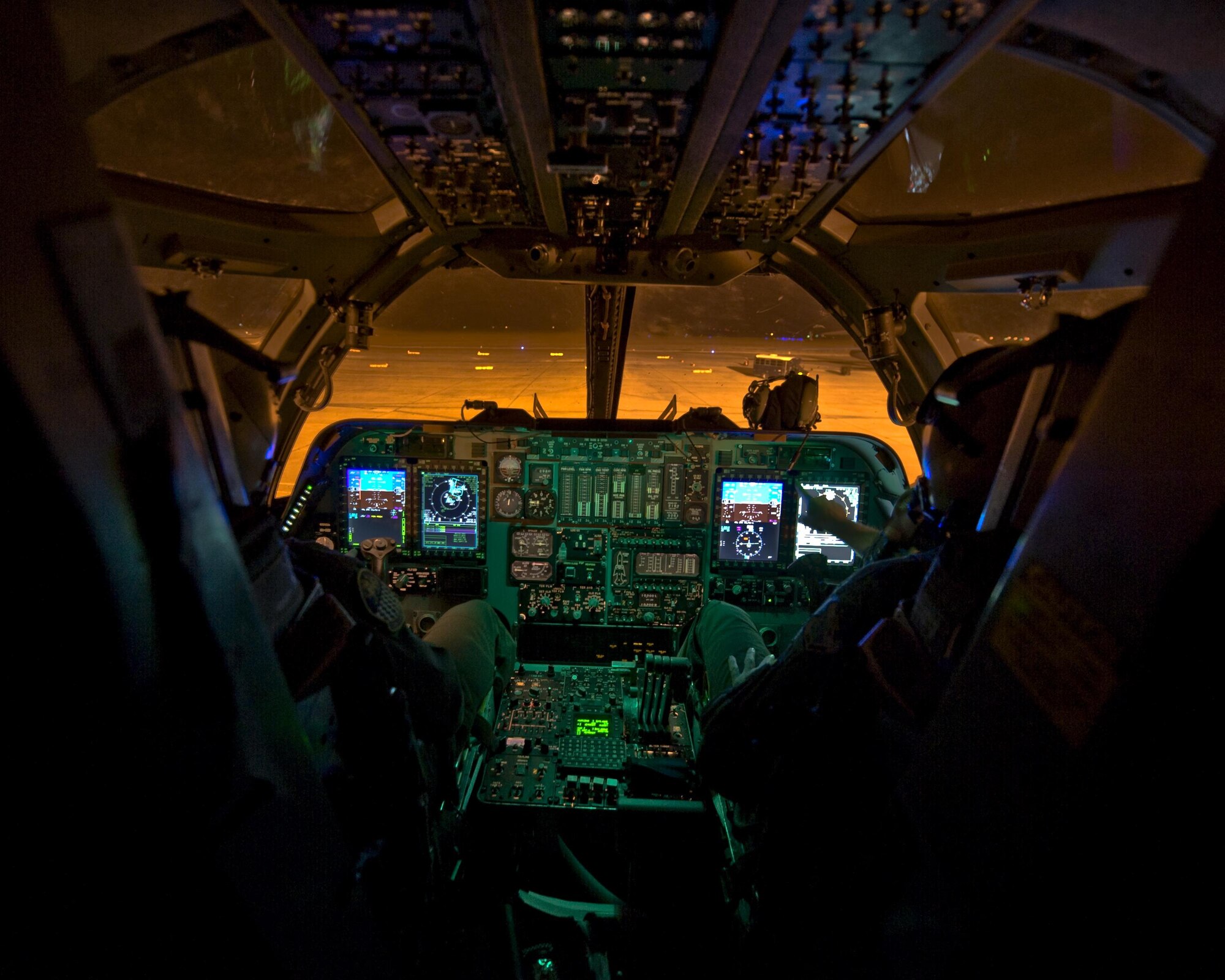 Maj. James Silva (left) and Lt. Col. Steven Myers complete a flight in the first newly-upgraded operational B-1B Lancer Jan. 21, 2014, at Dyess Air Force Base, Texas. The B-1B was recently upgraded with an Integrated Battle Station, which is a combination of three different upgrades, including a Fully Integrated Data Link, Vertical Situation Display upgrade and Central Integrated System upgrade. Silva and Myers are B-1B pilots. (U.S. Air Force photo/Staff Sgt. Richard Ebensberger)