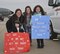The Balas family has their signs ready at Joint Base McGuire-Dix-Lakehurst, N.J., Dec. 21, 2016, for the return SSgt Jason Balas an 108th Wing Crew Chief, from his deployment. SSgt Balas and 25 other 108th Airmen returned home after supporting operation Inherent Resolve. (U.S. Air National Guard photo by Staff Sgt. Ross A. Whitley/Released)