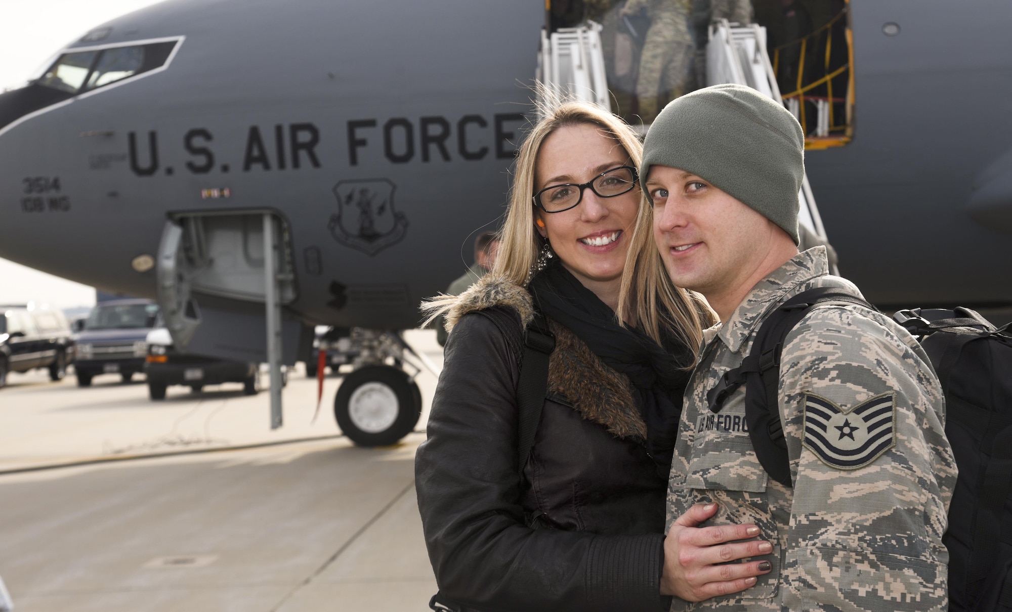Technical Sergeant Bjorn Fecher, 108th Aerospace Ground Equipment, reunites with his girl friend Jessica Jaquis, at Joint Base McGuire-Dix-Lakehurst, N.J., Dec. 21, 2016. This is Tech. Sgt. Fecher’s 7th deployment in 15 years. (U.S. Air National Guard photo by Staff Sgt. Ross A. Whitley/Released)