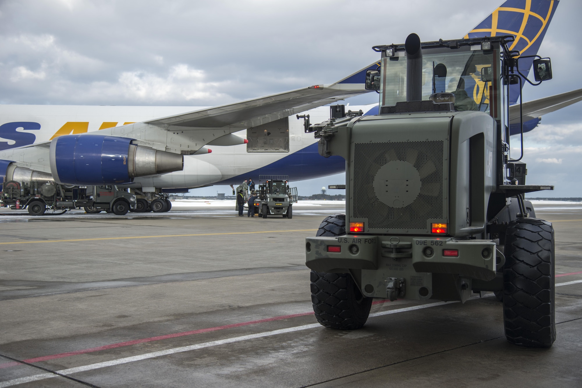 Forklifts move cargo at Misawa Air Base, Japan, Feb. 4, 2017. Airmen built pallets two days prior in preparation for exercise COPE NORTH 17. During the cargo movement, the 35th Logistics Readiness Squadron moved 85.6 short tons in two chalks for CP17. (U.S. Air Force photo by Senior Airman Brittany A. Chase)