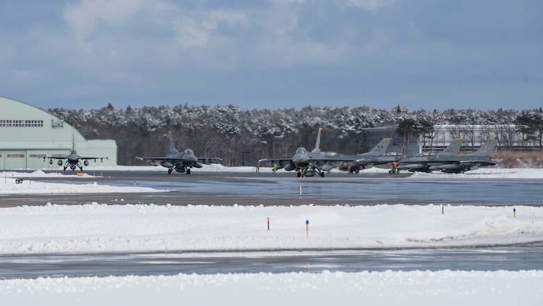 Three F-16 Fighting Falcons taxi on the runway at Misawa Air Base, Japan, Feb. 7, 2017. Airmen from the 14th Fighter Squadron departed to Andersen Air Force Base, Guam, as part of exercise COPE NORTH 17. The annual exercise serves as a keystone event promoting stability and security throughout the Indo-Asia-Pacific region by enabling regional forces to hone vital readiness skills critical to maintaining regional stability. (U.S. Air Force photo by Airman 1st Class Sadie Colbert)